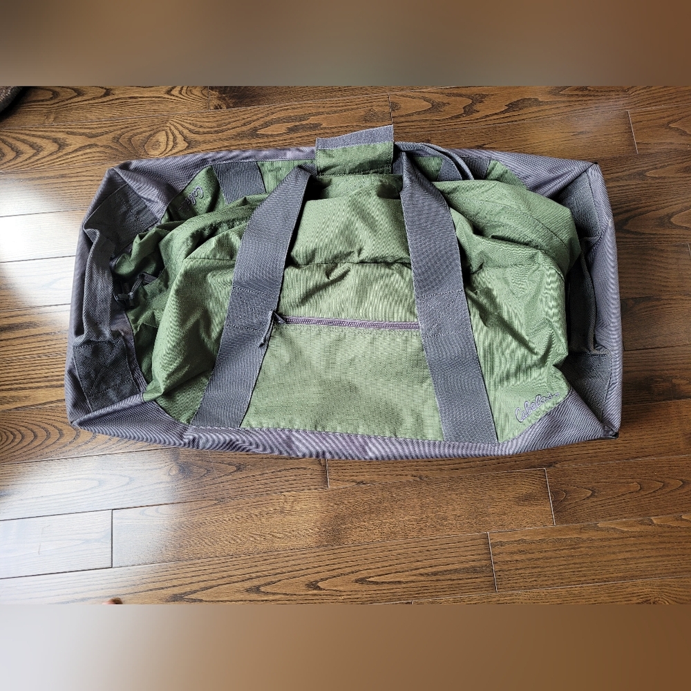 CABELAS Rolling Duffel Bag, Never Used, Just Stored.